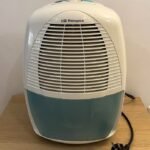 Deshumidificador portátil con rejilla y depósito de agua